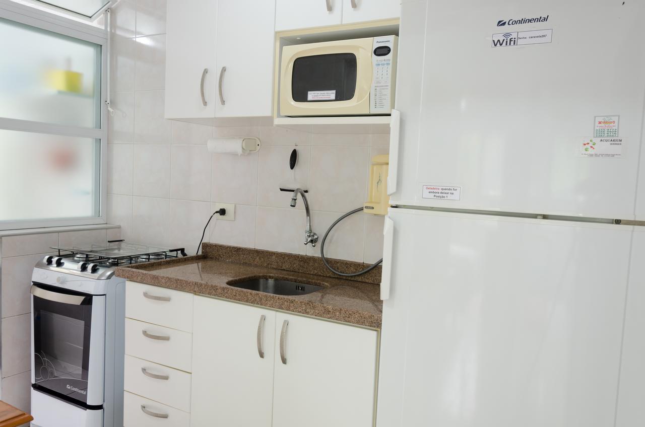 Apto com Ar condicionado a 200 m da praia - atrás do Shopping Enseada Apartamento Guarujá Exterior foto