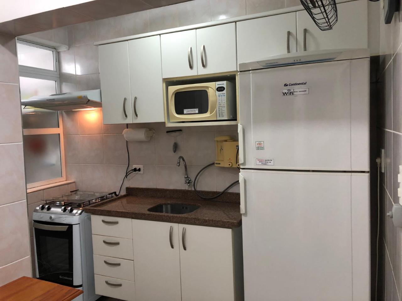 Apto com Ar condicionado a 200 m da praia - atrás do Shopping Enseada Apartamento Guarujá Exterior foto